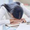 Woman experiencing fatigue and hormonal changes related to female hormone imbalance