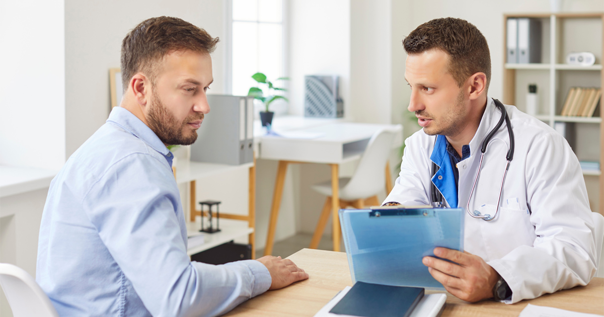 Man learning about testosterone therapy benefits for energy, recovery, and hormone health